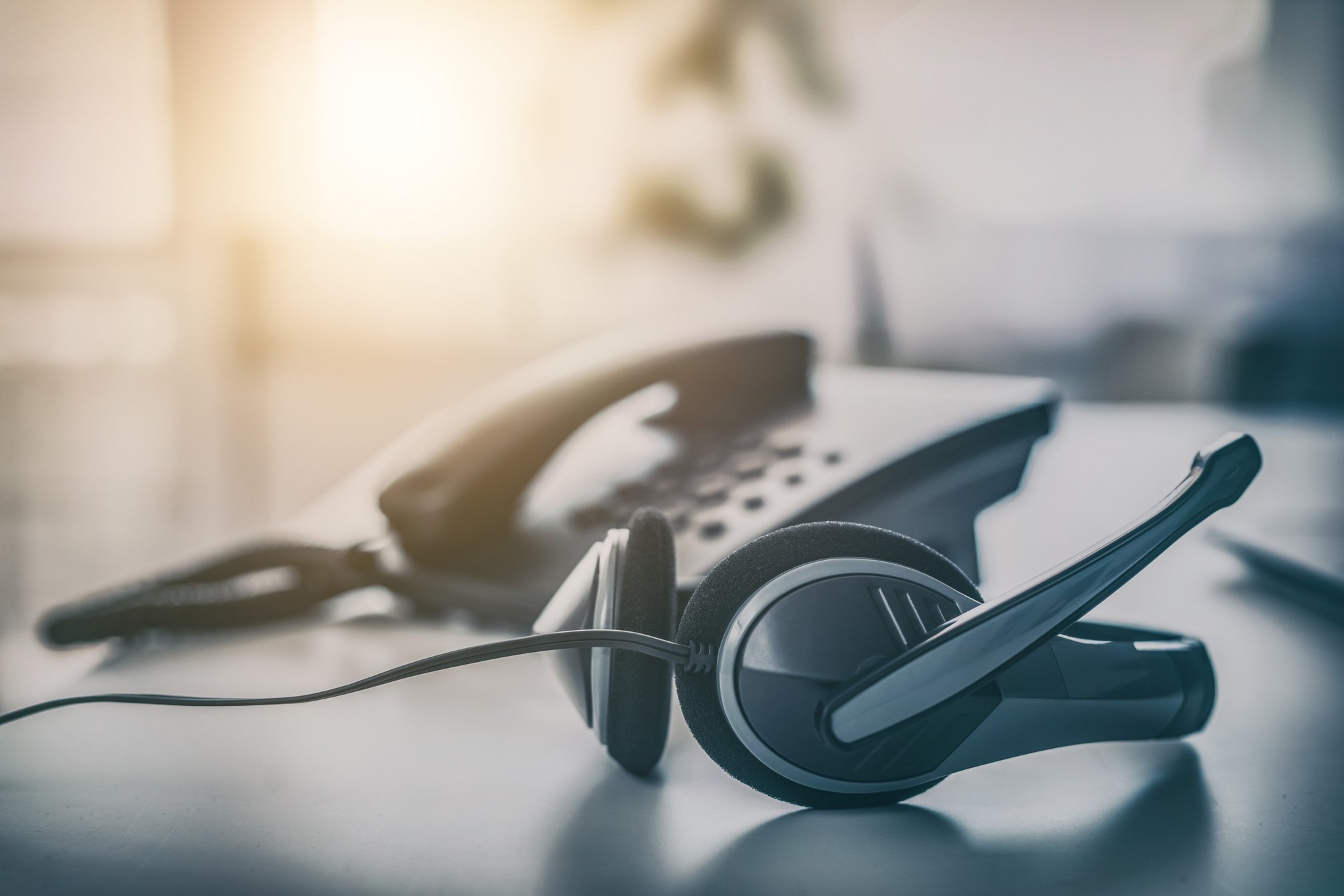 Telephone and Headphone on Table